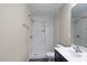 Bathroom features walk-in shower with a single sink vanity and neutral wall color at 1536 Ricochet Dr, Raleigh, NC 27610
