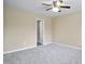 A spacious bedroom is freshly painted and carpeted, with an adjoining bathroom at 1536 Ricochet Dr, Raleigh, NC 27610