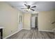 Living room space featuring neutral paint, outdoor access, and new wood flooring at 1536 Ricochet Dr, Raleigh, NC 27610