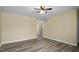Open living space featuring neutral paint, recessed lighting, and new wood flooring at 1536 Ricochet Dr, Raleigh, NC 27610