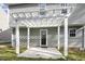 A covered back patio perfect for entertaining or relaxing outside at 1536 Ricochet Dr, Raleigh, NC 27610