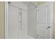 The clean, white shower stall provides a functional space, freshly painted for a pristine look at 1536 Ricochet Dr, Raleigh, NC 27610