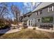 Spacious backyard with an outdoor seating area, fire pit, and dining space perfect for entertaining at 1603 N Alston Ave, Durham, NC 27701
