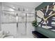 Modern bathroom featuring a glass-enclosed shower, contemporary fixtures, and stylish decor at 1603 N Alston Ave, Durham, NC 27701