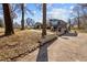 Street view of a property showing a driveway leading to both homes at 1603 N Alston Ave, Durham, NC 27701