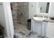 The bathroom features a walk in shower and accessible features at 1705 Mcrae Pl, Hillsborough, NC 27278