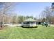 Exterior shot of a gazebo, playground, and pool in a well-manicured community area at 1705 Mcrae Pl, Hillsborough, NC 27278