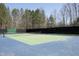 Enjoy a friendly match on this well-maintained outdoor tennis court, perfect for recreation and exercise at 1705 Mcrae Pl, Hillsborough, NC 27278