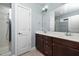 Bathroom features a double sink vanity, large mirror, and enclosed shower at 200 Mariah Towns Way, Garner, NC 27529