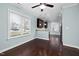 Cozy dining area with hardwood floors, a ceiling fan, and views into the kitchen at 200 Mariah Towns Way, Garner, NC 27529
