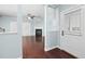 Bright entryway showcasing hardwood floors, a fireplace, and access to the living area at 200 Mariah Towns Way, Garner, NC 27529