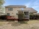 A spacious backyard with a deck and screened-in porch, perfect for outdoor entertaining and relaxation at 2012 Castana Ct, Willow Springs, NC 27592