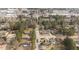 An aerial view of a neighborhood with mature trees, showcasing a peaceful and well-established community at 205 Parliament Pl, Dunn, NC 28334