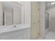 Bright bathroom with white vanity, shower stall, and hexagon tile flooring at 205 Parliament Pl, Dunn, NC 28334
