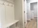 Functional mudroom with built-in bench and storage, providing a convenient space for organization at 207 Golfview Ave, Benson, NC 27504
