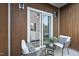 Cozy balcony with seating area visible from the bedroom, offering a private outdoor retreat at 208 Martin Luther King Jr Blvd, Raleigh, NC 27601