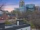 Enjoy breathtaking city views from this modern rooftop, complete with a stylish enclosed structure and outdoor space at 208 Martin Luther King Jr Blvd, Raleigh, NC 27601