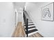Hallway with black and white stairs and sleek design at 208 Martin Luther King Jr Blvd, Raleigh, NC 27601