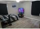 A compact bedroom offers comfort and style with light-colored floors and ambient ceiling light at 225 Sebastian Way, Rocky Mount, NC 27804