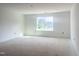Spacious bedroom with white walls and a large window that offers plenty of natural light, incomplete at 245 Golfview Ave, Benson, NC 27504