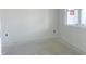 Bright bedroom with white walls, a large window, and ample natural light. Construction incomplete at 245 Golfview Ave, Benson, NC 27504