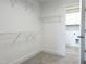 Walk-in closet with wire shelving at 245 Golfview Ave, Benson, NC 27504