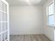 Home office featuring light wood floors, white walls, and a window with natural light at 245 Golfview Ave, Benson, NC 27504