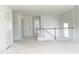 Bright, open staircase featuring white railings and light wood treads in a modern home design at 245 Golfview Ave, Benson, NC 27504