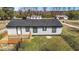 Single-story home with a fenced backyard and wooden deck, perfect for entertaining at 3005 Lewy Ln, Rocky Mount, NC 27801