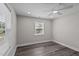 Inviting bedroom featuring modern vinyl plank flooring and a window for natural lighting at 3005 Lewy Ln, Rocky Mount, NC 27801