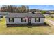 Well-kept home exterior featuring a lush lawn and decorative flower beds at 3005 Lewy Ln, Rocky Mount, NC 27801