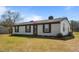 A charming one-story house with neat landscaping and a welcoming entrance at 3005 Lewy Ln, Rocky Mount, NC 27801