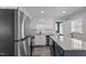 Updated kitchen featuring stainless steel appliances, granite countertops, and a stylish center island at 3005 Lewy Ln, Rocky Mount, NC 27801