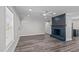 Sunlit living area with a fireplace, recessed lighting, and stylish, neutral walls at 3005 Lewy Ln, Rocky Mount, NC 27801