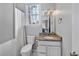Bathroom with granite countertop, a vanity, and a shower with white shower curtain at 308 Burnt Pine Ct, Apex, NC 27502