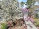 Aerial view of a home with flowers and a tree at 308 Burnt Pine Ct, Apex, NC 27502