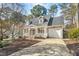 Charming home featuring a welcoming front porch and a one-car garage with a driveway at 308 Burnt Pine Ct, Apex, NC 27502