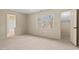 Spacious bedroom with carpet, large windows, and closet space provide ample storage at 3207 Coachmans Way, Durham, NC 27705