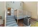Exterior deck with stairs leading to backyard, showcasing outdoor living space at 3207 Coachmans Way, Durham, NC 27705