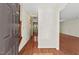 Inviting foyer with hardwood floors leading to a bright and spacious living area at 3207 Coachmans Way, Durham, NC 27705
