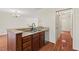 Kitchen island with double sink and stainless steel dishwasher at 3207 Coachmans Way, Durham, NC 27705