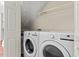 Laundry room with white washer and dryer at 3207 Coachmans Way, Durham, NC 27705