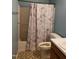 Functional bathroom features a shower-tub combination and vintage design at 3226 Powhatan Rd, Clayton, NC 27527