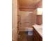 Bathroom with walk-in tub and shower, vanity, and toilet at 3226 Powhatan Rd, Clayton, NC 27527