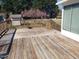 Spacious wooden deck, ideal for outdoor entertaining and relaxation at 3226 Powhatan Rd, Clayton, NC 27527