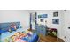 A bedroom with a Mario-themed bed set and decorations is well lit by natural light at 352 Leonard Rd, Louisburg, NC 27549