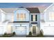 Charming two-story home with a garage and beautifully landscaped front yard at 4006 Kidd Pl, Durham, NC 27703