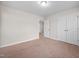 Bedroom with neutral decor, closet, and carpet flooring for a cozy living space at 4038 Patriot Ridge Ct, Raleigh, NC 27610