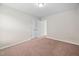 This bedroom has neutral-toned walls, carpeted floors, and a standard double door closet at 4038 Patriot Ridge Ct, Raleigh, NC 27610