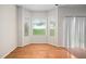 Bright breakfast area featuring hardwood floors, windows and view to outside at 4038 Patriot Ridge Ct, Raleigh, NC 27610